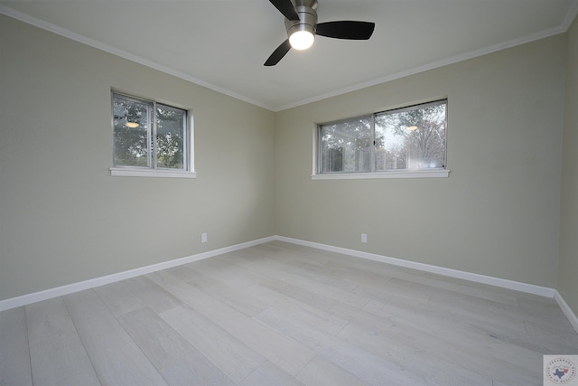 unfurnished room featuring ceiling fan, light hardwood / wood-style flooring, and ornamental molding