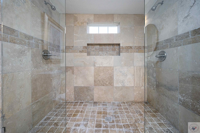 bathroom featuring tiled shower