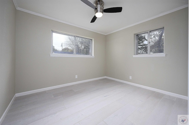 empty room featuring light wood-type flooring, ceiling fan, and ornamental molding