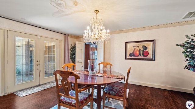 dining room featuring french doors, visible vents, baseboards, an inviting chandelier, and wood finished floors