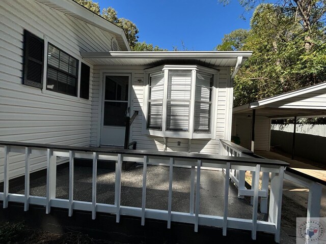 view of home's exterior with a deck