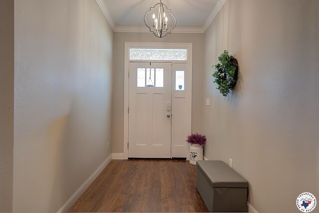80 Chester Field Cir, Texarkana, TX 75503 - entrance foyer featuring dark wood finished floors, ornamental molding, a chandelier, and baseboards