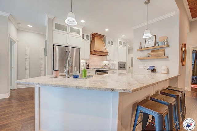 80 Chester Field Cir, Texarkana, TX 75503 - kitchen featuring custom exhaust hood, stainless steel appliances, ornamental molding, dark wood-style floors, and open shelves