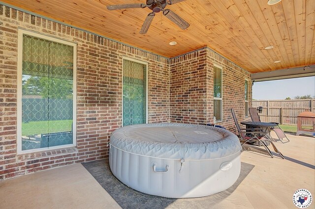 80 Chester Field Cir, Texarkana, TX 75503 - view of patio / terrace featuring a hot tub and a ceiling fan