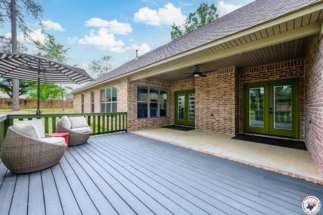 3401 Skyline Blvd, Texarkana, TX 75503 - deck with french doors, ceiling fan, and fence