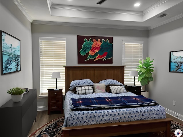 3401 Skyline Blvd, Texarkana, TX 75503 - bedroom featuring a raised ceiling, wood finished floors, and ornamental molding