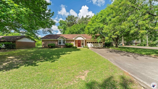 6209 N Park Rd, Texarkana, TX 75503 - single story home featuring brick siding, an attached garage, a front lawn, and driveway