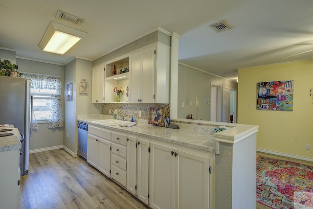 kitchen featuring open shelves, white cabinets, visible vents, and stainless steel appliances