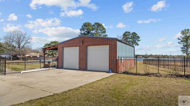 detached garage featuring fence