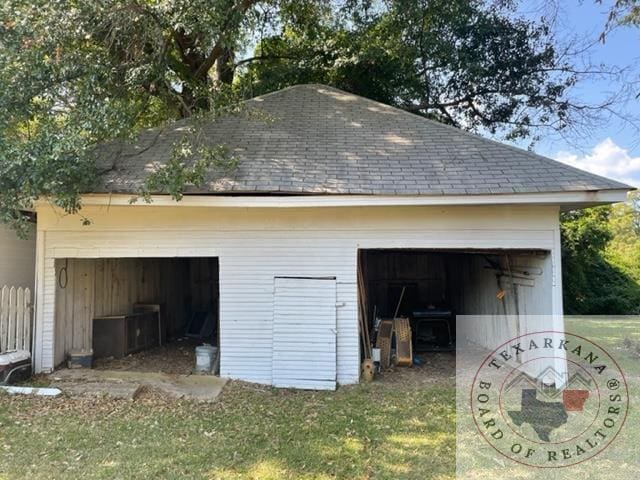 garage with a lawn