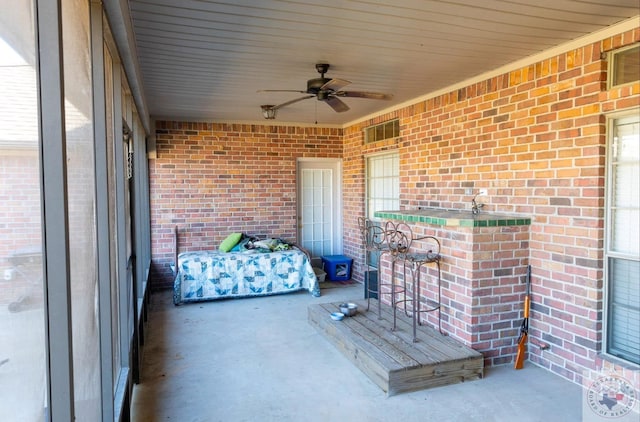 view of patio / terrace with ceiling fan