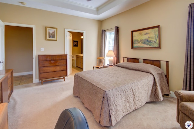3705 Connie Ln, Texarkana, TX 75503 - bedroom with light colored carpet, crown molding, a raised ceiling, and ensuite bathroom