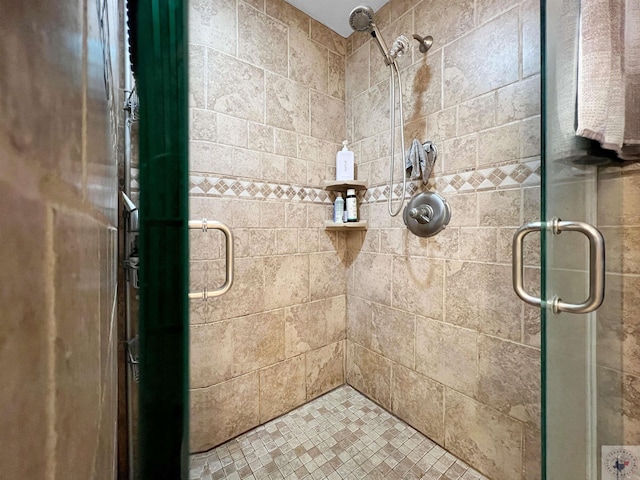 bathroom featuring an enclosed shower