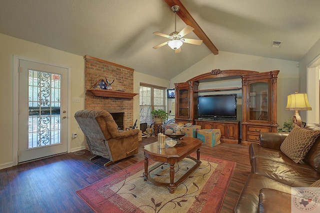 living room featuring a fireplace, dark wood-type flooring, lofted ceiling with beams, and ceiling fan