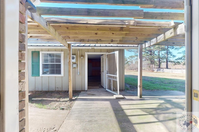 doorway to property with a pergola