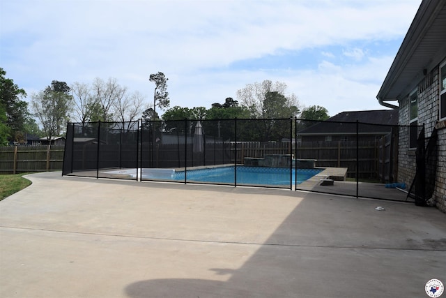 view of pool with a patio area, a fenced backyard, and a fenced in pool