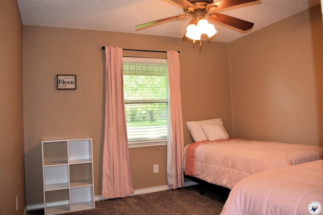 carpeted bedroom with a ceiling fan