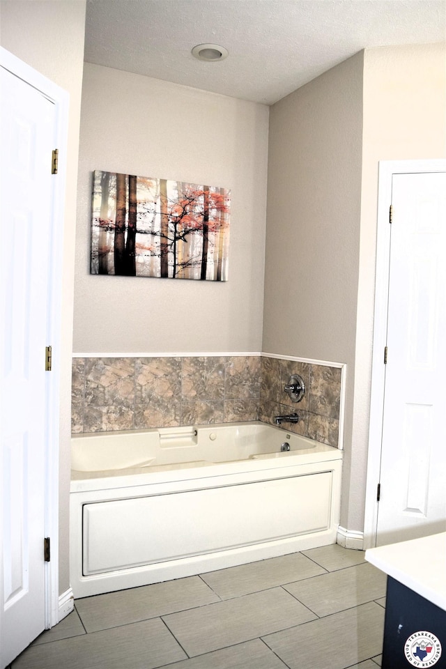 4802 David Dr, Texarkana, TX 75503 - bathroom featuring a bath, vanity, and tile patterned flooring