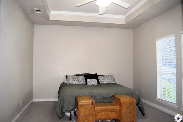 4802 David Dr, Texarkana, TX 75503 - carpeted bedroom featuring baseboards, a tray ceiling, ornamental molding, and a ceiling fan
