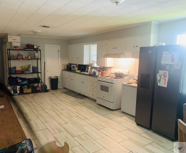 kitchen with white cabinetry, light hardwood / wood-style flooring, ornamental molding, white gas range, and fridge with ice dispenser