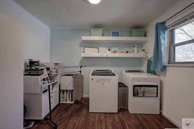 washroom with washer and clothes dryer, dark wood-type flooring, and ornamental molding