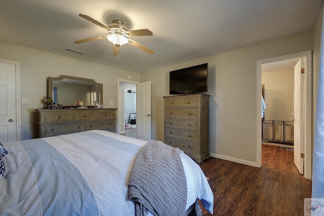 bedroom with ceiling fan and dark hardwood / wood-style floors