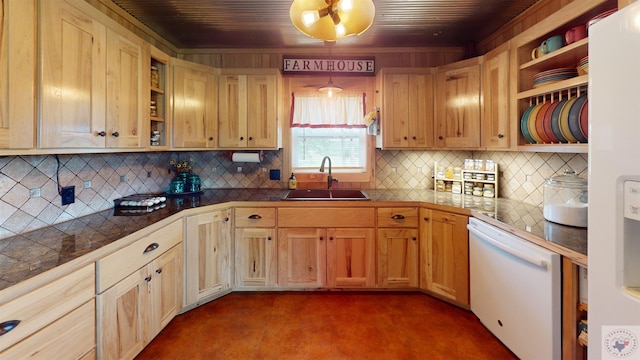 kitchen with sink, white appliances, light brown cabinetry, and tasteful backsplash