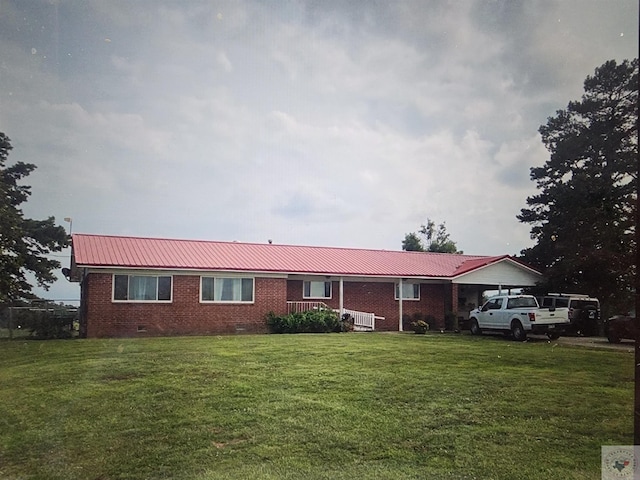 ranch-style home with a front yard