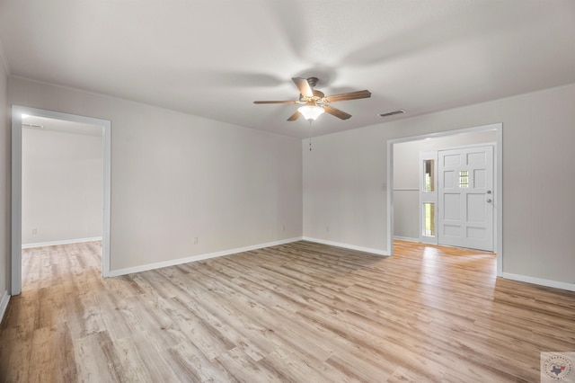 unfurnished room with light hardwood / wood-style floors and ceiling fan