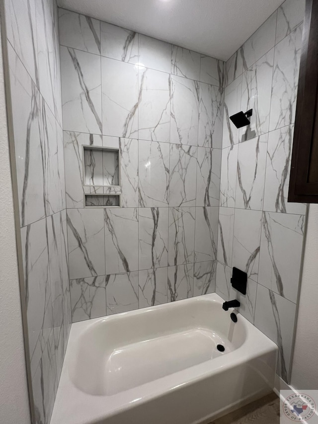 bathroom featuring washtub / shower combination