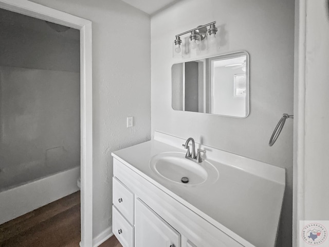 bathroom featuring vanity and hardwood / wood-style floors