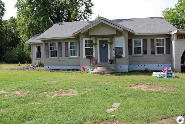 4302 E 9th St, Texarkana, AR 71854 - view of front of property with crawl space, a front lawn, and roof with shingles