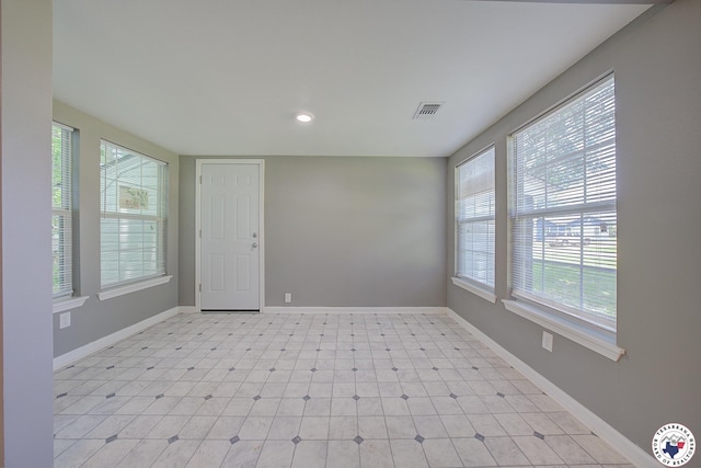 1107 Wheeler St, Texarkana, TX 75501 - spare room featuring plenty of natural light, baseboards, recessed lighting, and light flooring