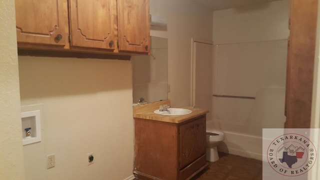 full bathroom with tub / shower combination, toilet, and vanity