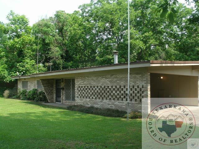 view of home's exterior featuring a lawn