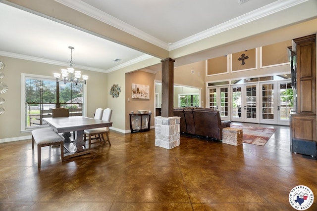 5710 Clearwood Trl, Texarkana, AR 71854 - dining area with decorative columns, french doors, a chandelier, crown molding, and baseboards