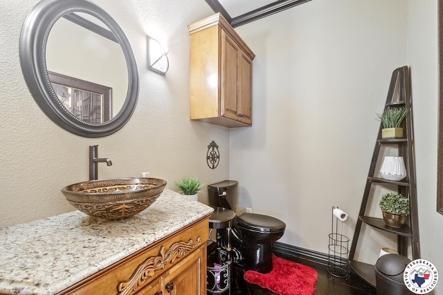 5710 Clearwood Trl, Texarkana, AR 71854 - bathroom featuring toilet and vanity