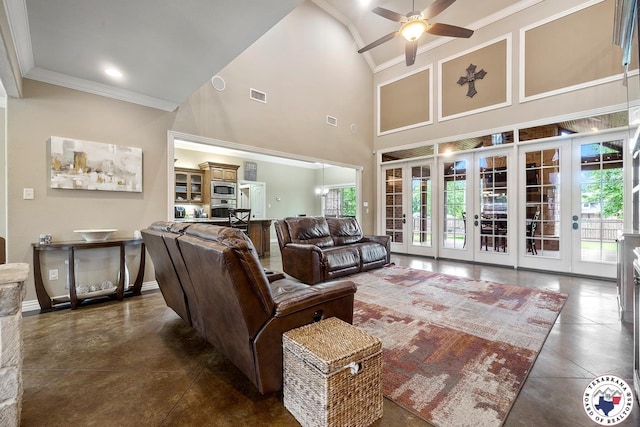 5710 Clearwood Trl, Texarkana, AR 71854 - living room with french doors, ceiling fan, a towering ceiling, crown molding, and concrete flooring