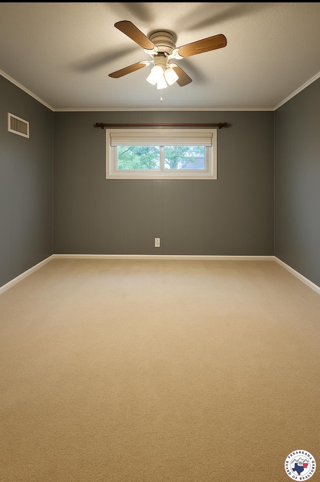 24 Desoto Cir, Texarkana, TX 75503 - spare room featuring carpet, a ceiling fan, and crown molding