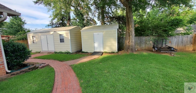 view of outbuilding featuring a yard