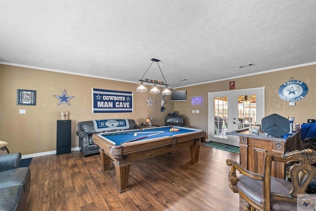 rec room with crown molding, a textured ceiling, billiards, french doors, and dark hardwood / wood-style floors