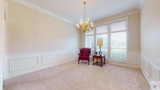 sitting room with a chandelier, light colored carpet, and ornamental molding