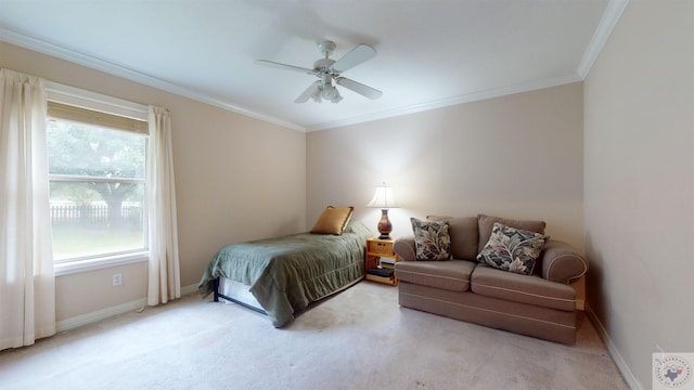 carpeted bedroom with ceiling fan, ornamental molding, and multiple windows