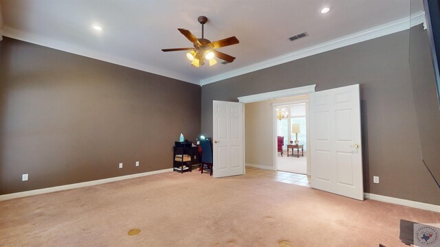 unfurnished bedroom with ceiling fan, light colored carpet, and ornamental molding