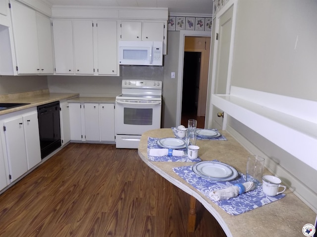 4024 Main St, Texarkana, TX 75503 - kitchen with white appliances, white cabinetry, and light countertops