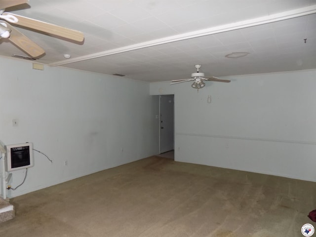 4024 Main St, Texarkana, TX 75503 - empty room featuring heating unit, ceiling fan, and carpet flooring