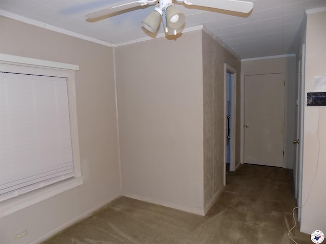 4024 Main St, Texarkana, TX 75503 - spare room with crown molding, carpet floors, and a ceiling fan