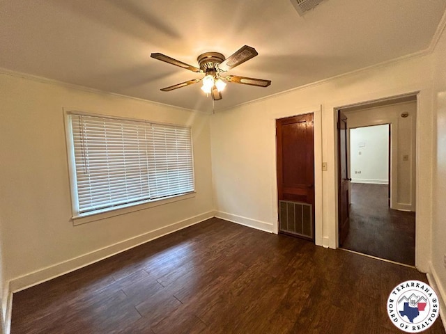 120 N St, Douglassville, TX 75560 - unfurnished bedroom featuring dark wood finished floors, baseboards, visible vents, and crown molding