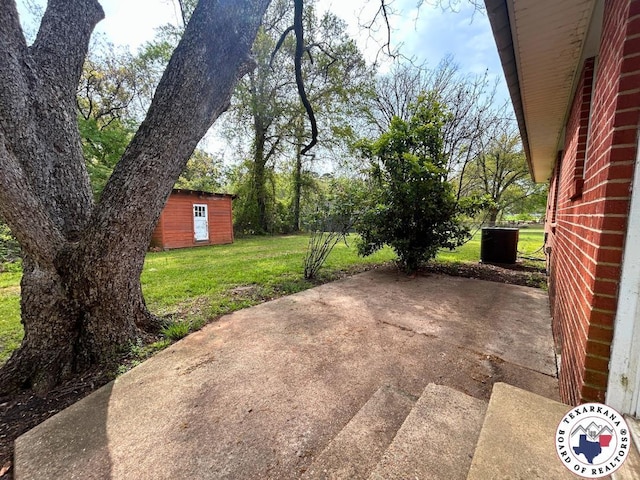 120 N St, Douglassville, TX 75560 - view of patio / terrace featuring an outbuilding
