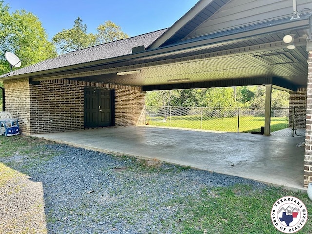 19913 Fm 125, Bivins, TX 75555 - view of parking with a carport, fence, and driveway